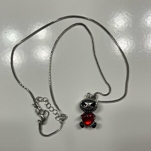 Skeleton Holding Heart Necklace